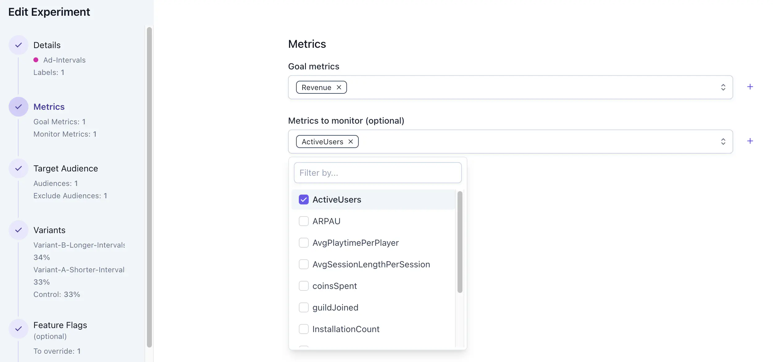 Edit Experiment Metrics tab showing goal metrics and monitor metrics selectors